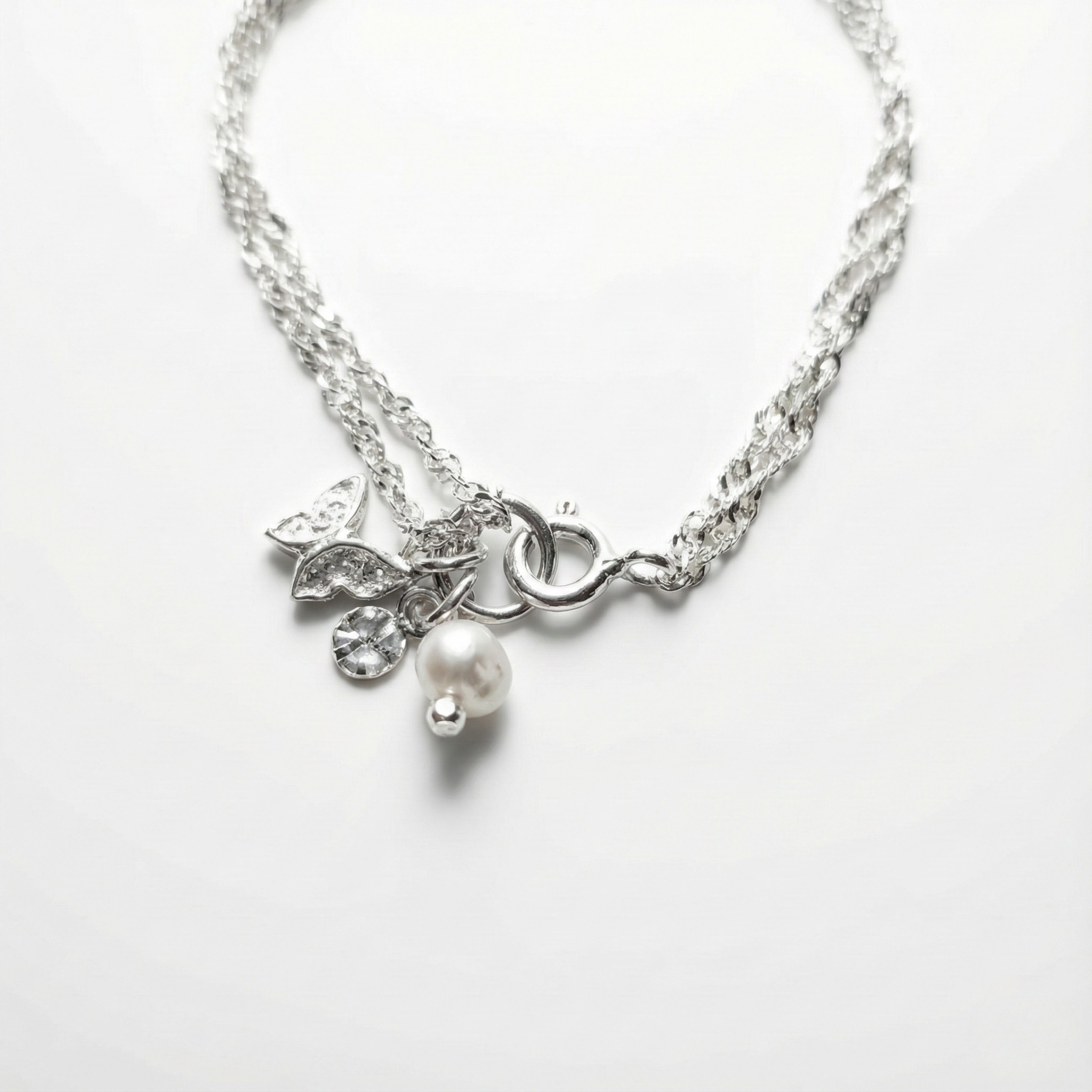 Pulsera Luz de Luna con Perla y Mariposa